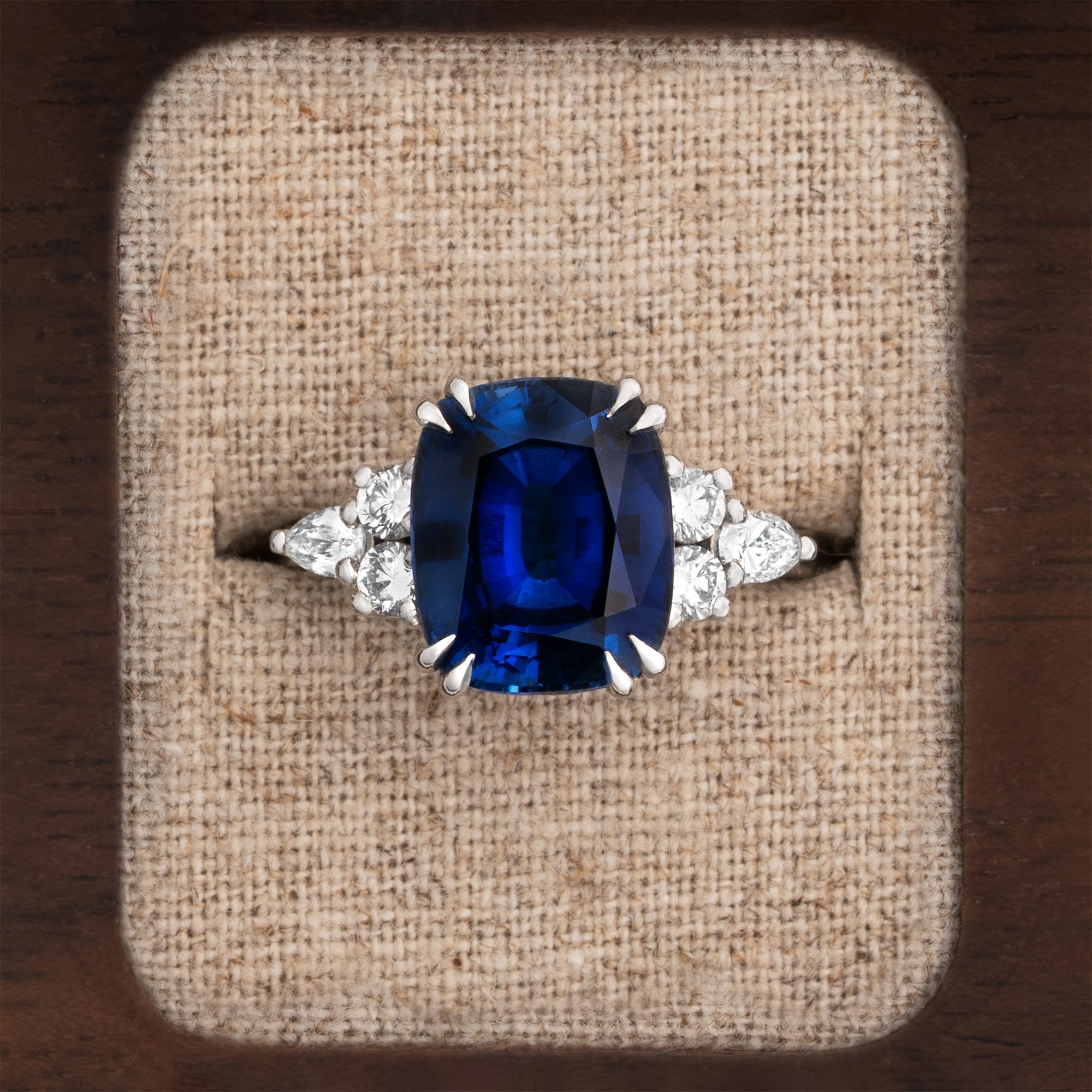 Cushion cut lab grown blue sapphire and diamond ring in platinum — 1
