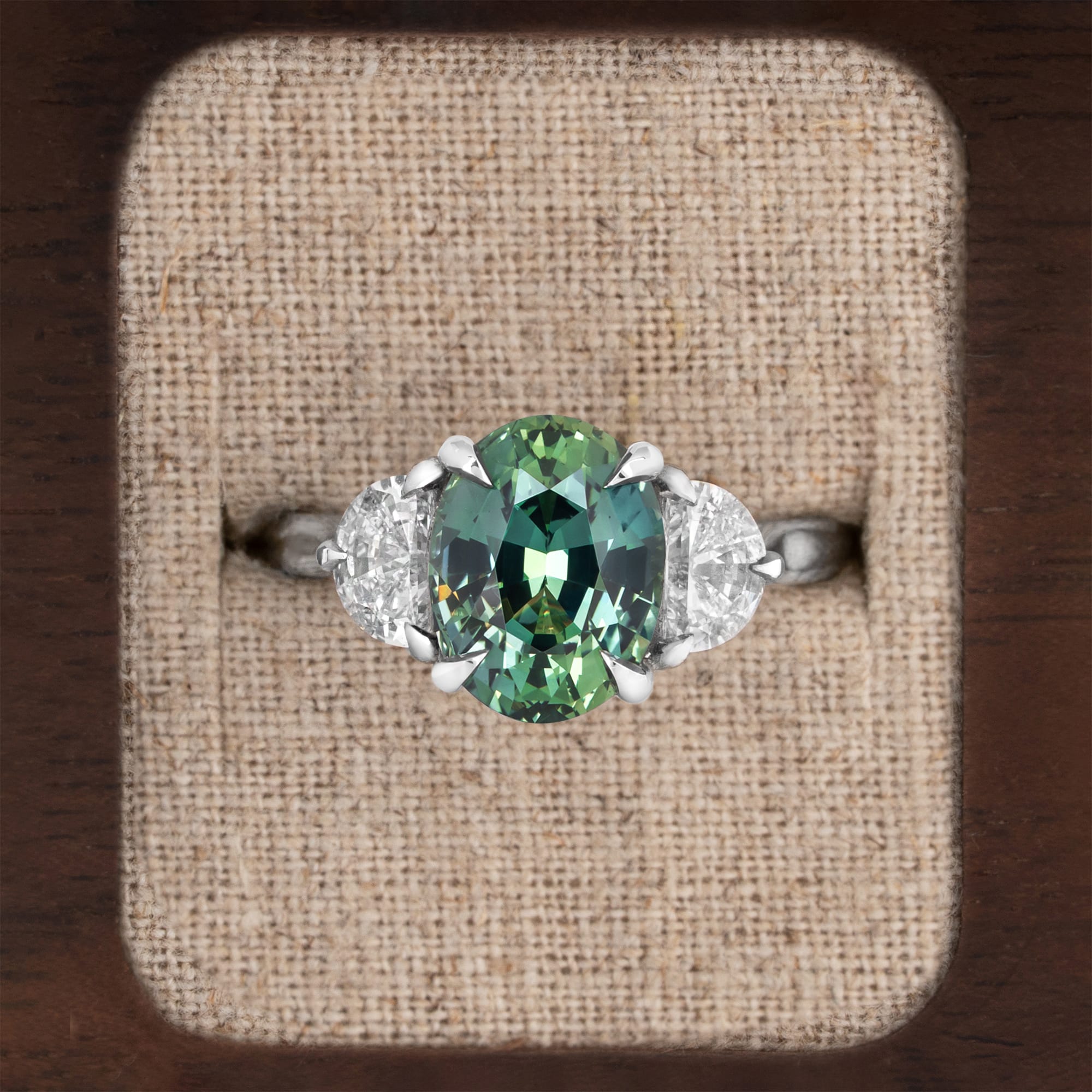 Teal sapphire and half moon diamond ring