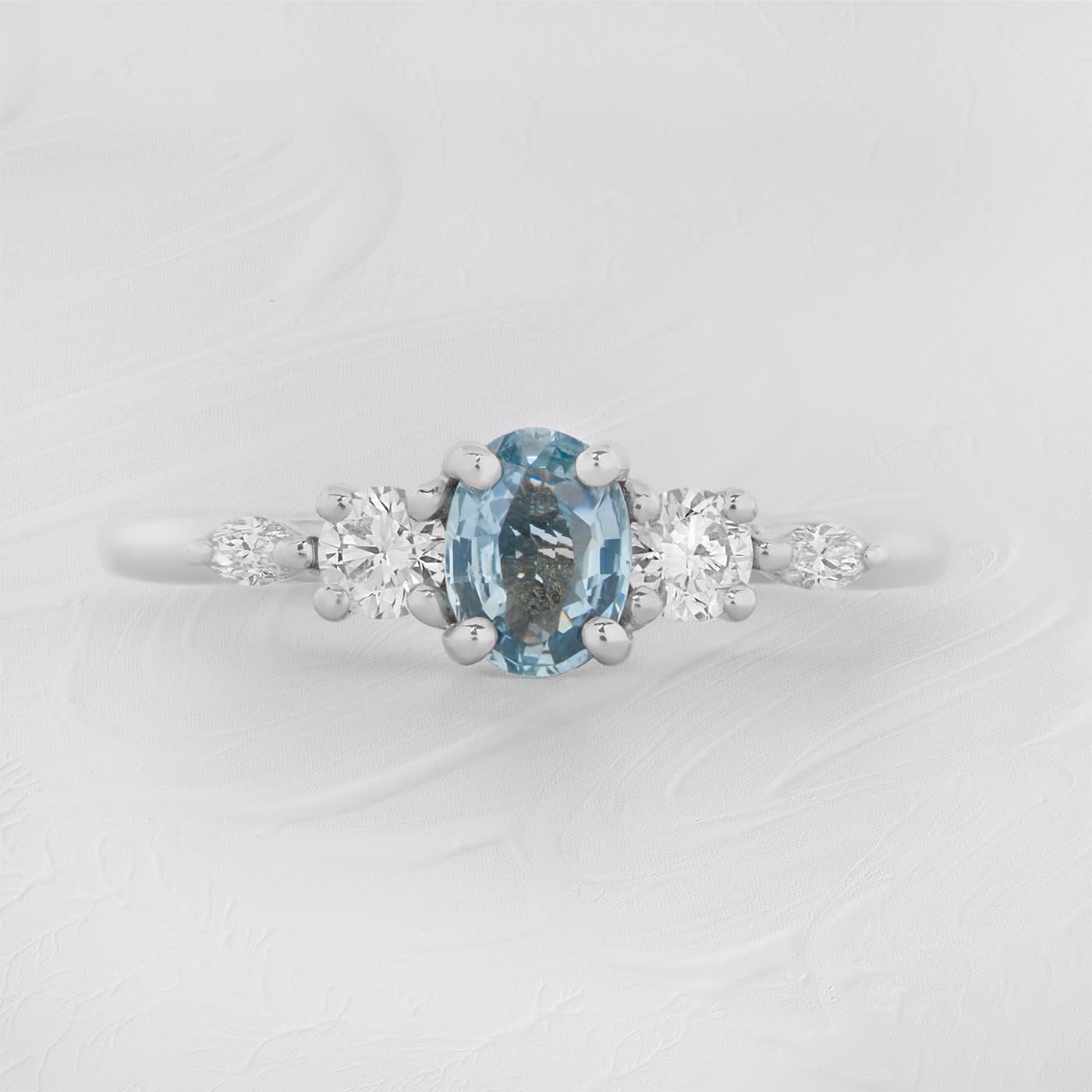 Oval light blue sapphire and diamond trellis ring  product image
