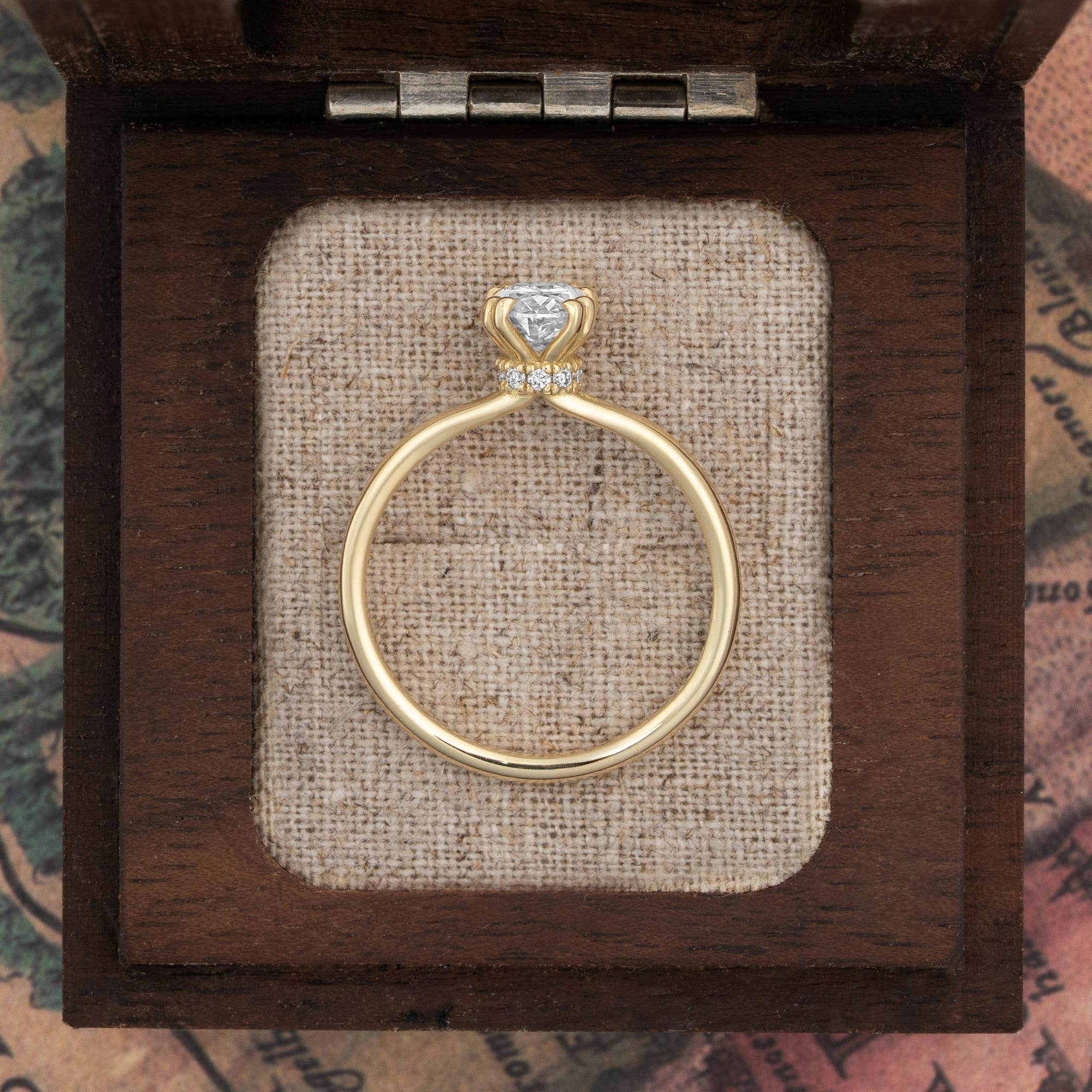 Oval lab grown diamond hidden halo engagement ring