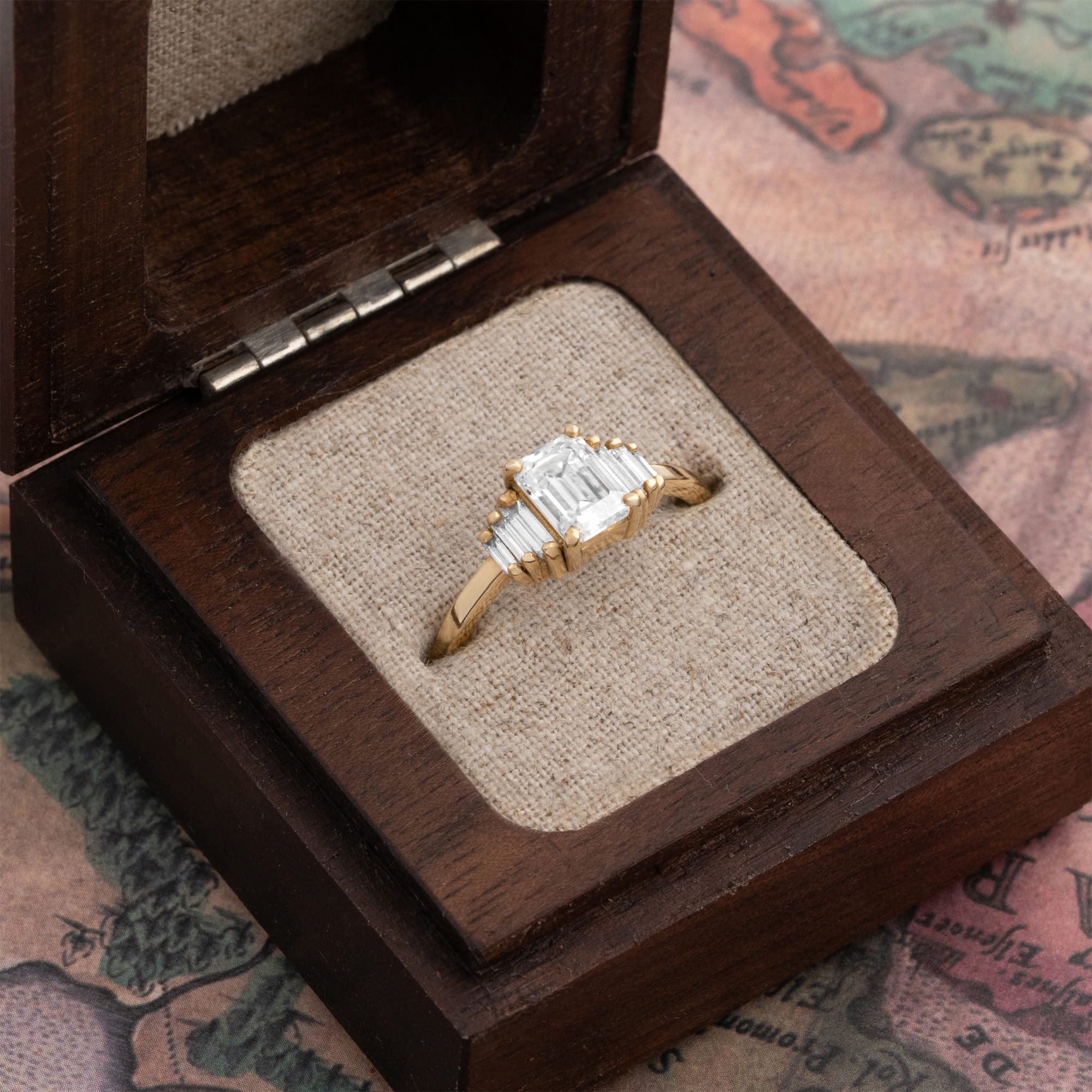 Emerald cut moissanite and baguette diamond engagement ring — 3