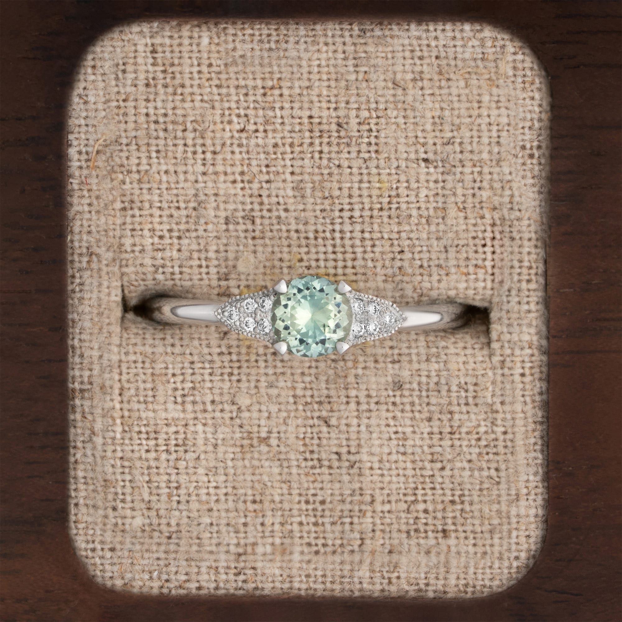 Seafoam green sapphire and diamond engagement ring 