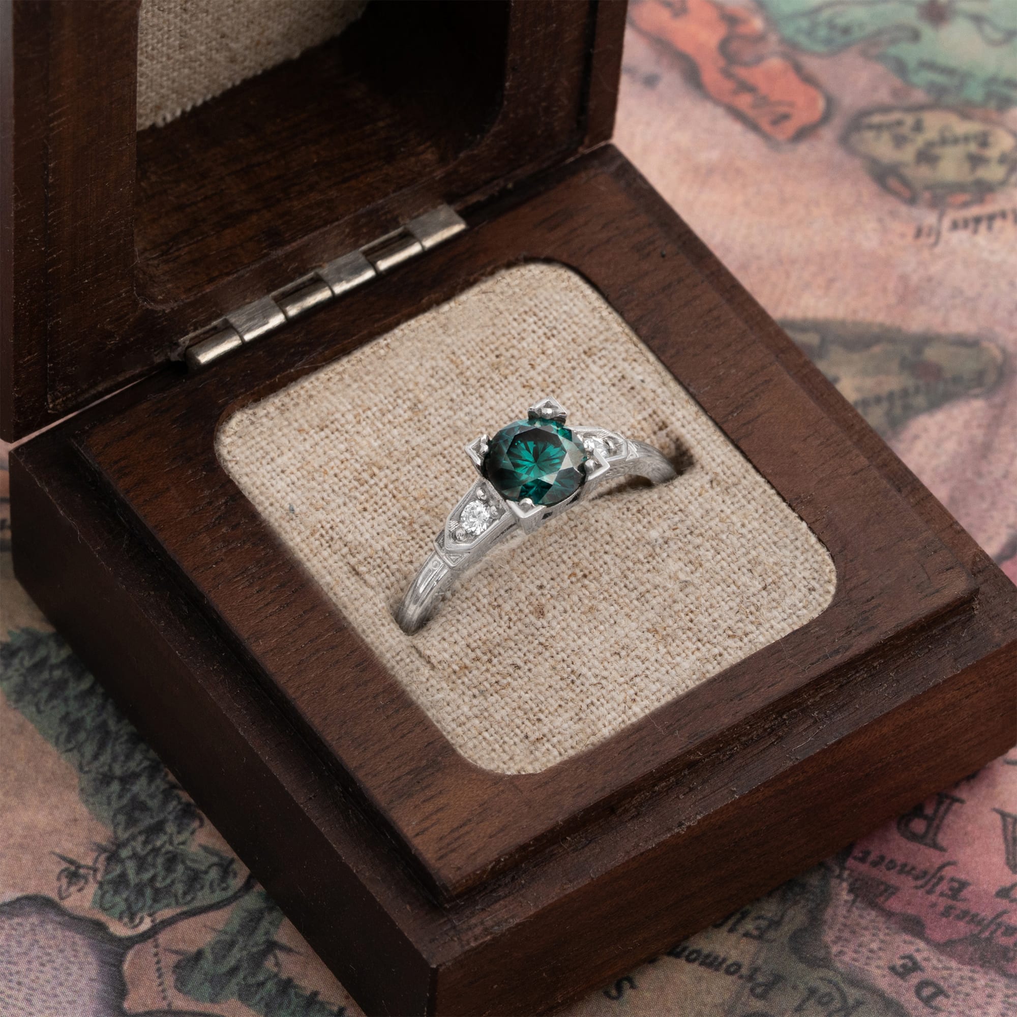 Teal green moissanite and diamond engagement ring — 2