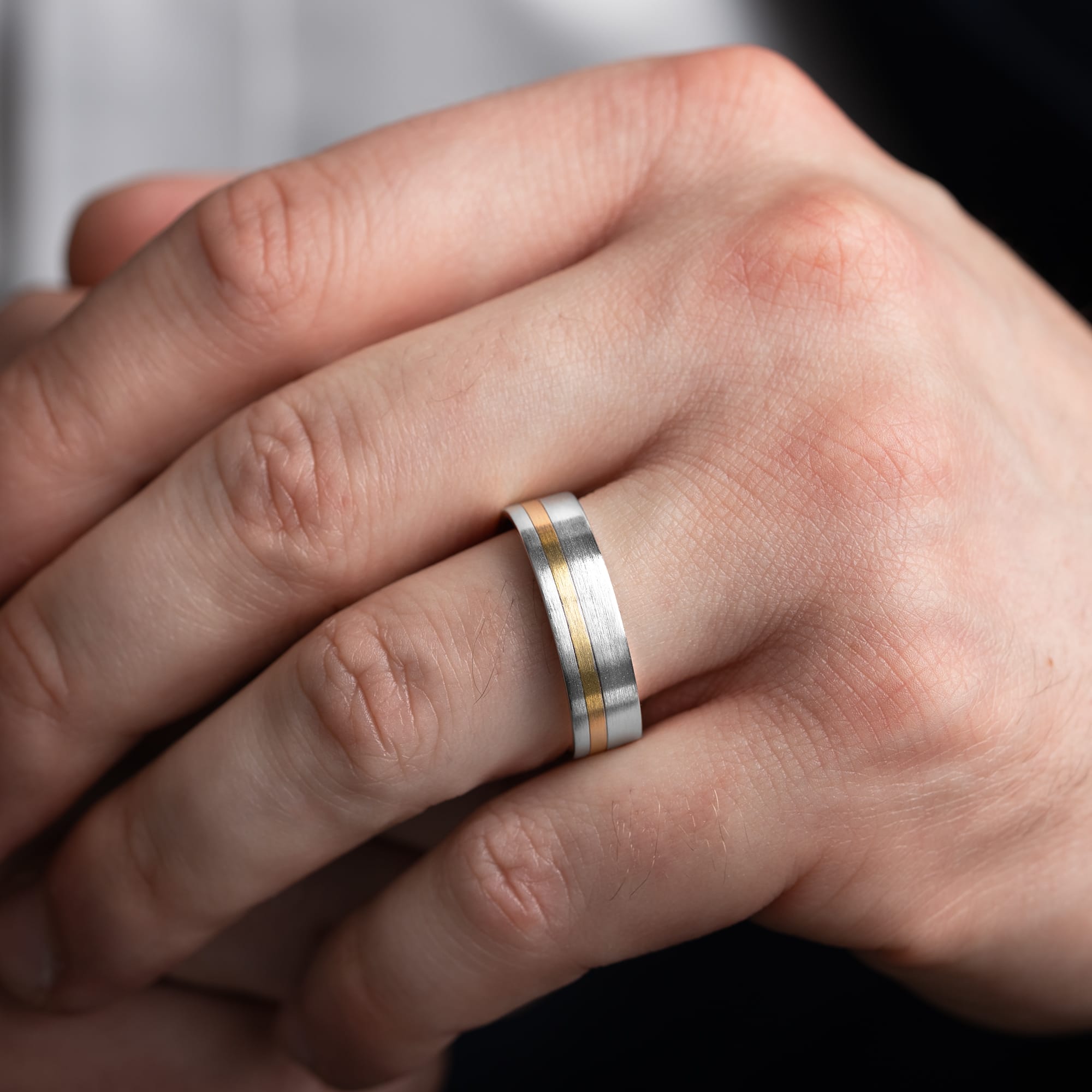 Two tone offset brushed wedding band