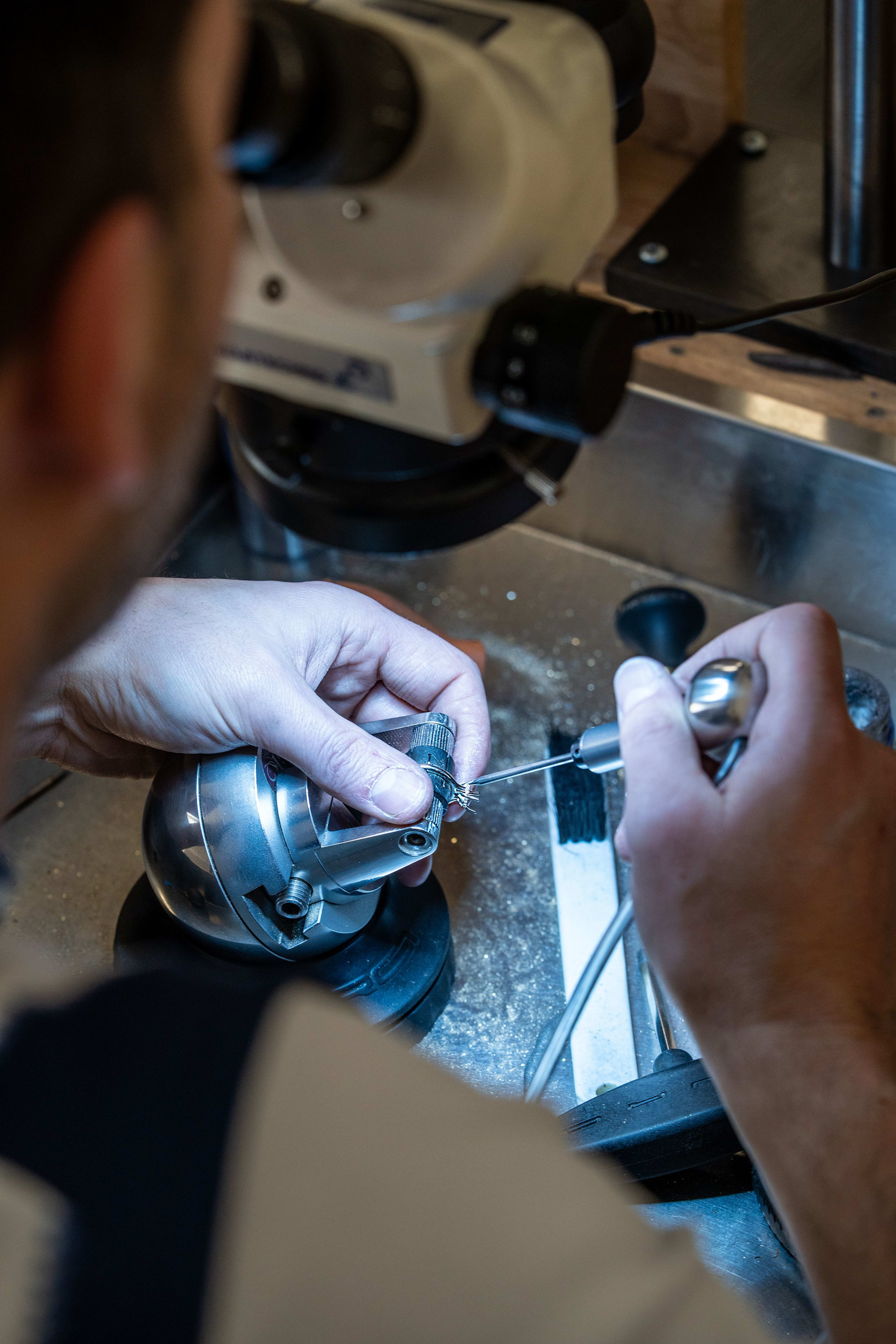 Aardvark stone setter, setting a gem into a ring