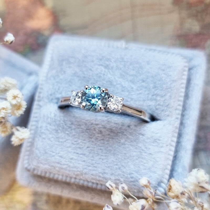 Lab grown aqua blue diamond trilogy ring in platinum Aardvark