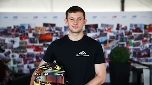 Cool colours mixed with camo Joshua Dufek on his racing helmet design