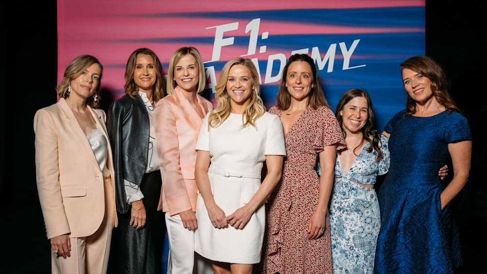 Lazenby far right alongside Isabelle Stewart Sara Rea Susie Wolff Reese Witherspoon Daisy Lilley Mollie Block & Sarah Lazenby