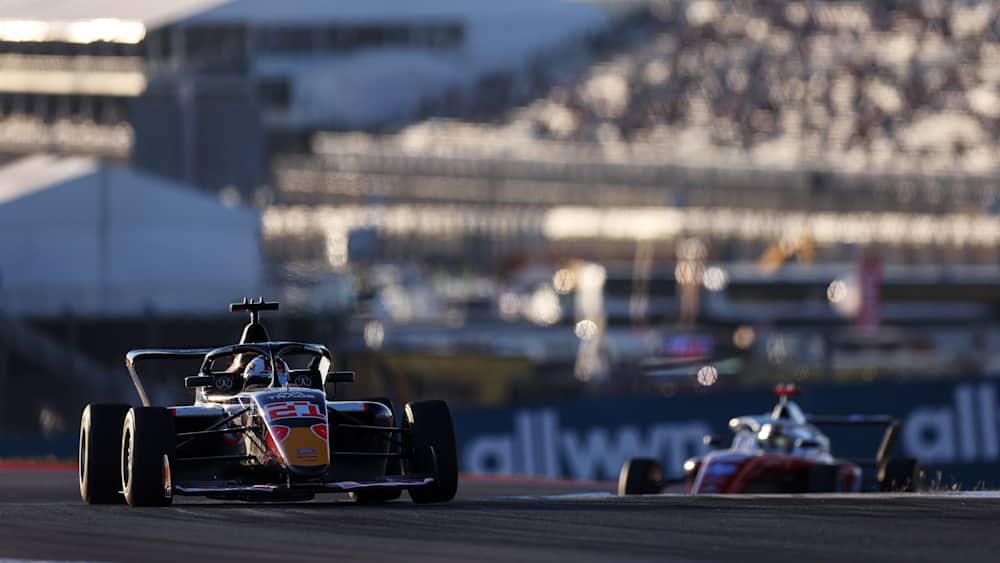 The Red Bull Racing driver then had to contend with Larsen chasing her down sticking firmly within the one-second window