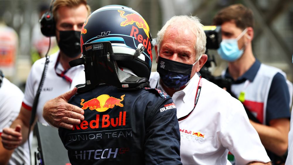 Vips is congratulated by Dr. Helmut Marko after he became the first driver in the modern era of F2 to win two races in a single round at Baku