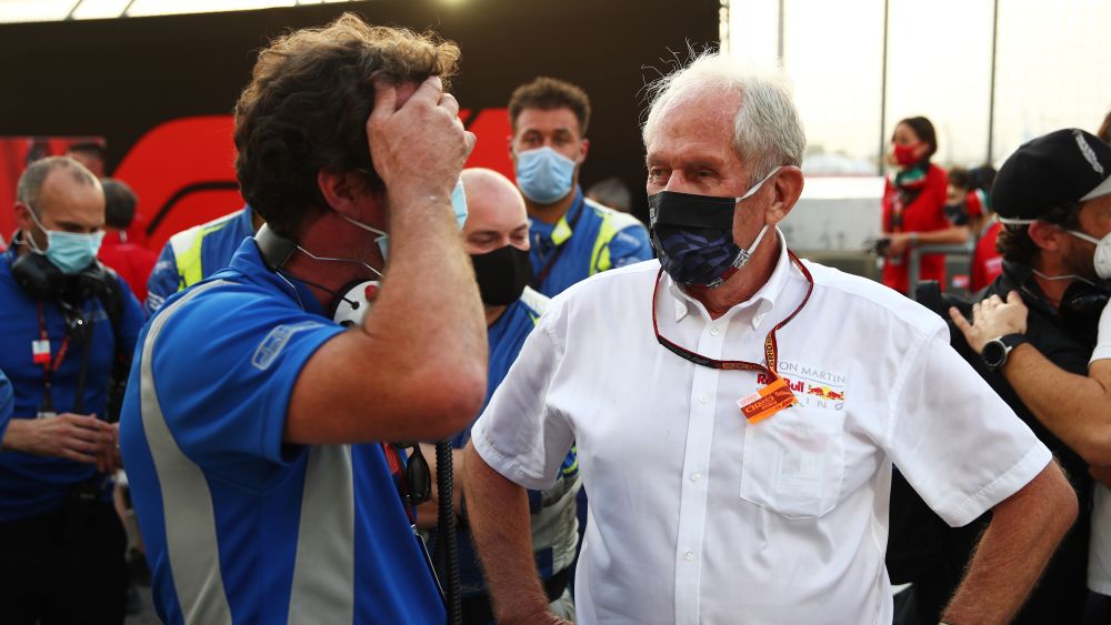 Trevor Carlin L speaking with Red Bulls Helmut Marko R