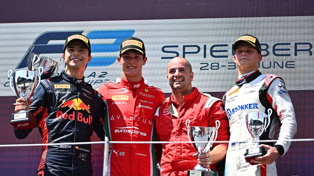 The top three drivers on the podium