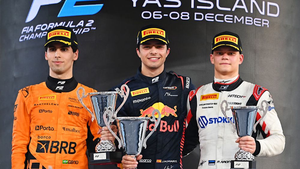 The top three celebrate their podiums after the Sprint Race