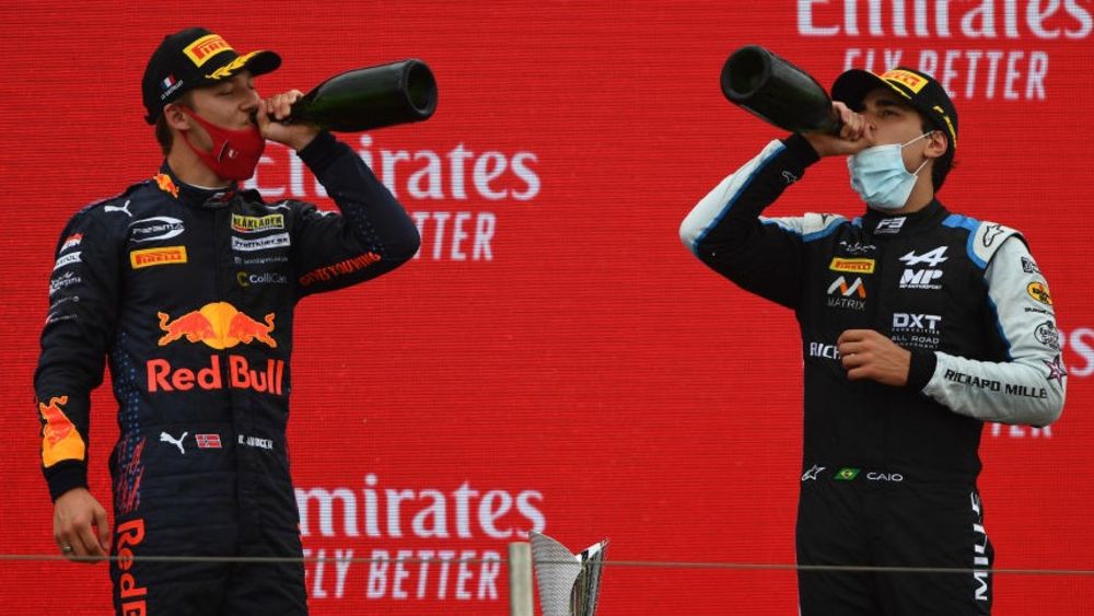 Collet R on the podium with Drivers Champion Hauger L