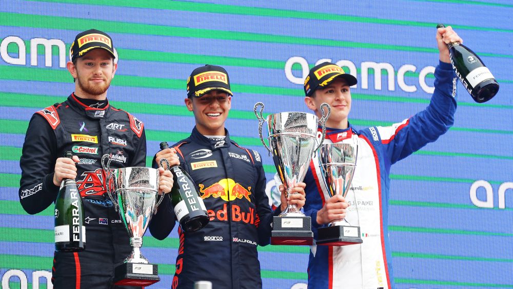 The top three celebrate their podium after the Barcelona Feature Race