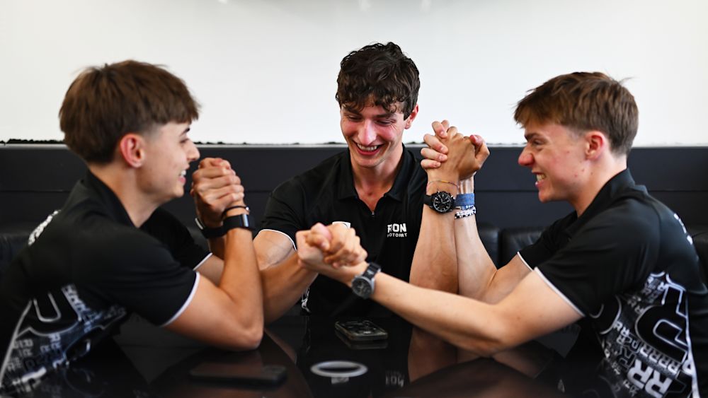 Bilinski took down both of his teammates in a three-way arm wrestle