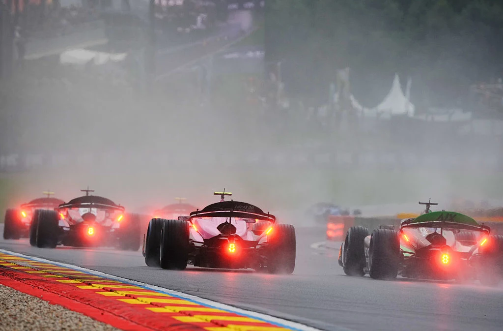 Formula 2 cars running in wet conditions at Spa-Francorchamps