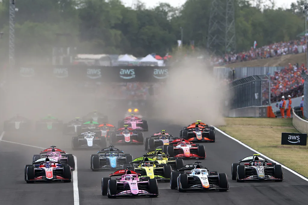 Formula 2 field races into the opening corners during the 2026 Budapest Feature Race at the Hungaroring