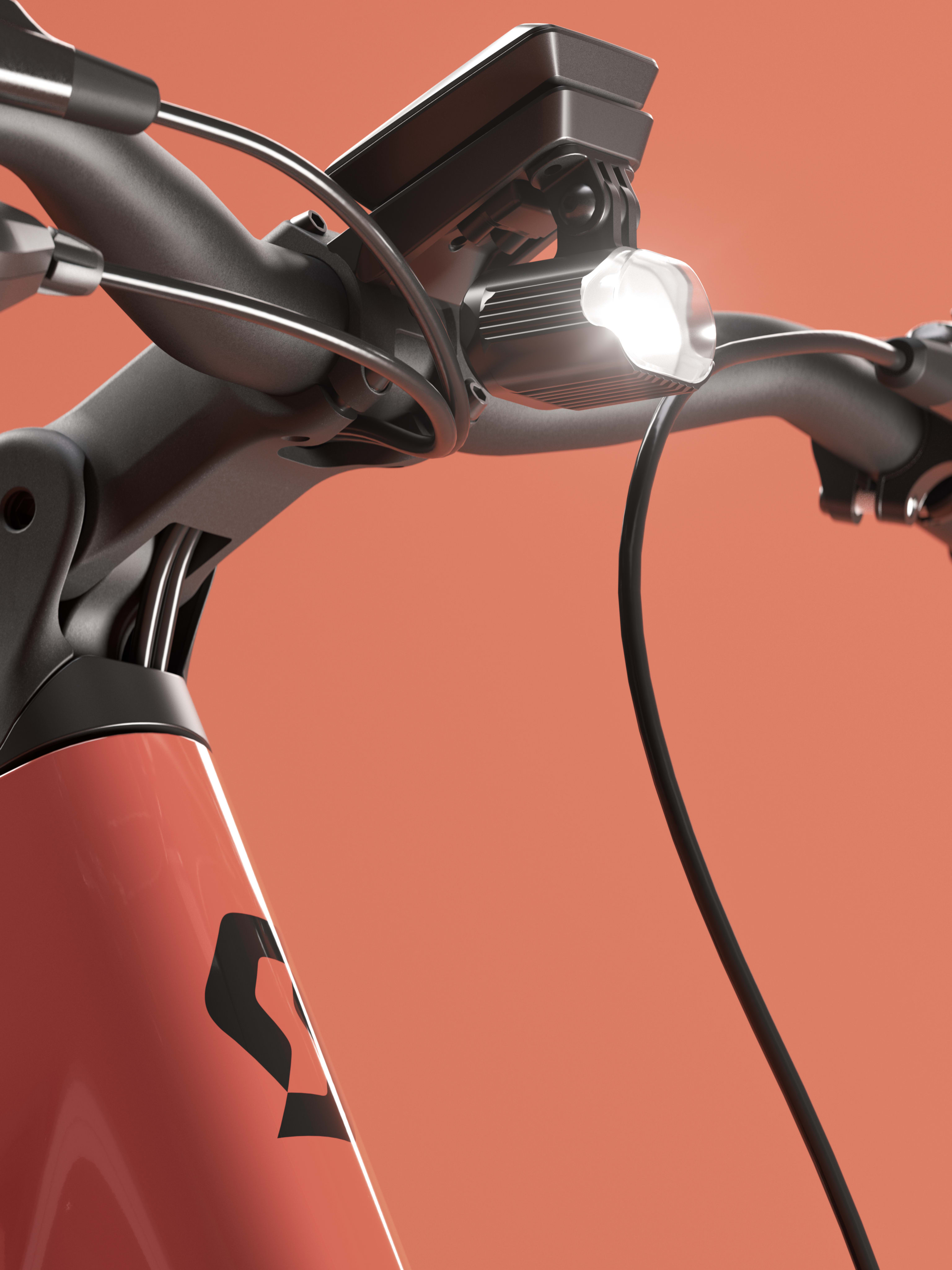Close-up of an electric scooter’s handlebars and display against a solid coral background, showcasing the brake levers, grips, and a front light.