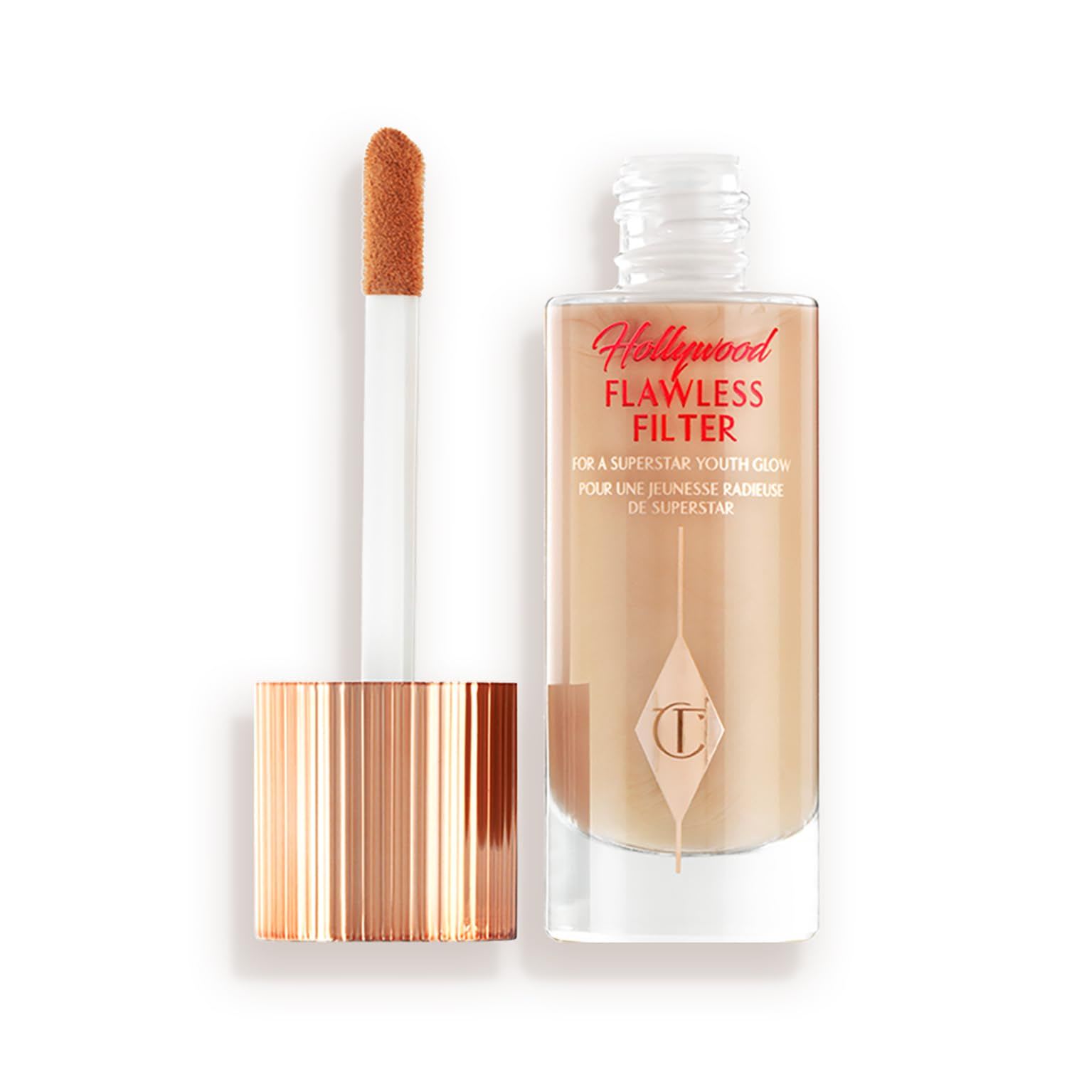 Charlotte Tilbury Hollywood Flawless Filter, shown with a doe-foot applicator, designed to add a radiant, soft-focus glow to the skin.