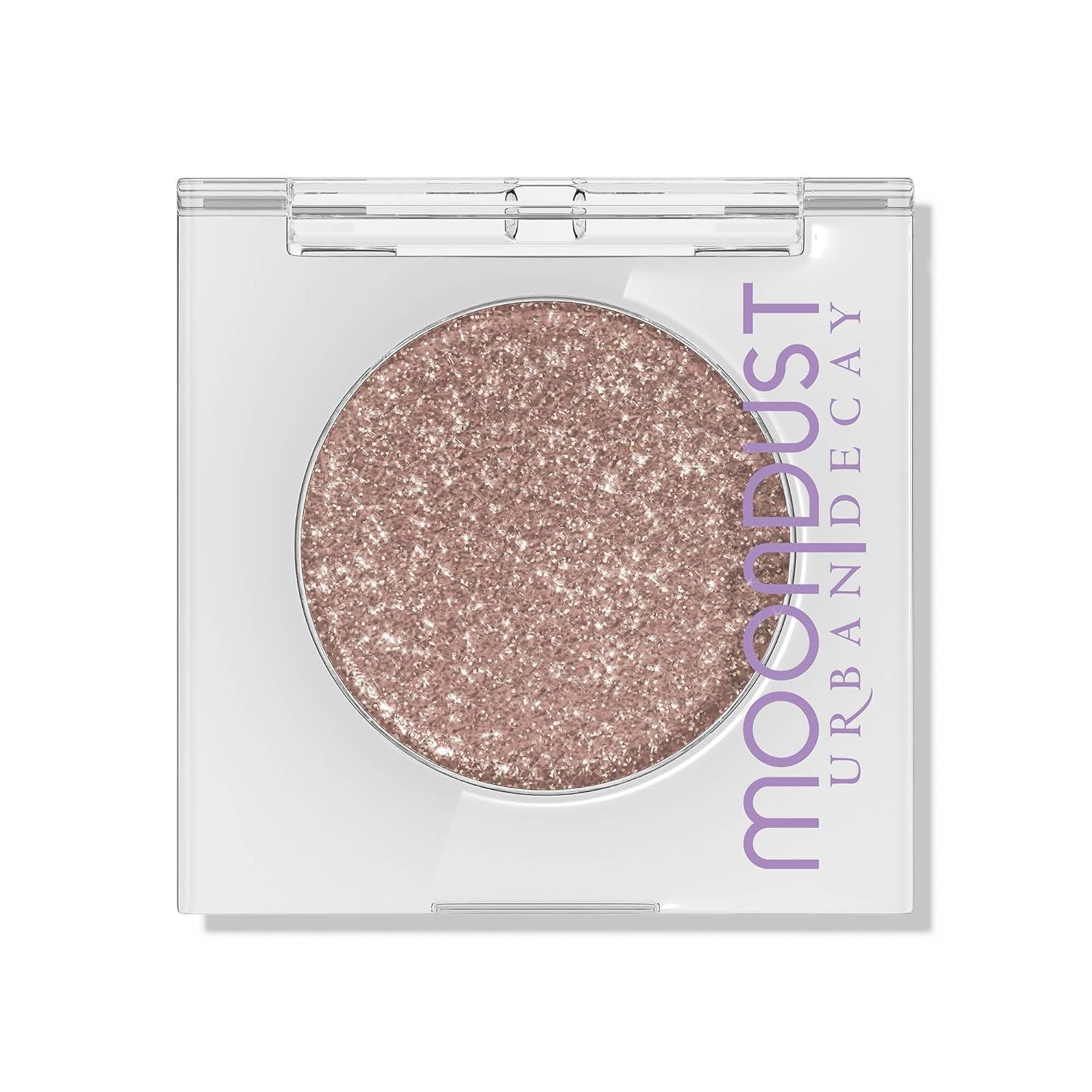 Urban Decay Moondust eyeshadow in a sparkling champagne-taupe shade, shown in a compact with a high-glitter finish for intense shimmer.