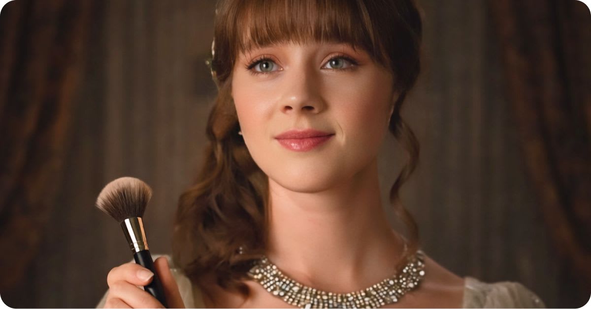 A young woman in Regency-era styling holding a fluffy powder brush, wearing soft pink lips, a diamond necklace, and an updo with bangs.