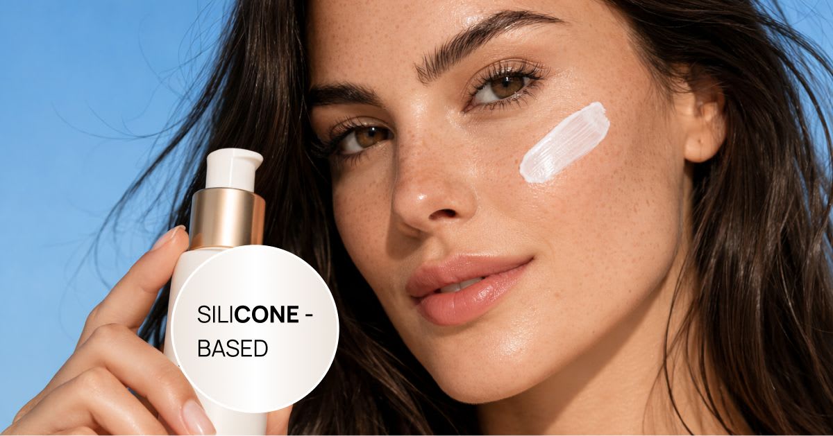 Woman holding a silicone-based sunscreen bottle with a product swatch on her cheek, labeled "silicone-based."