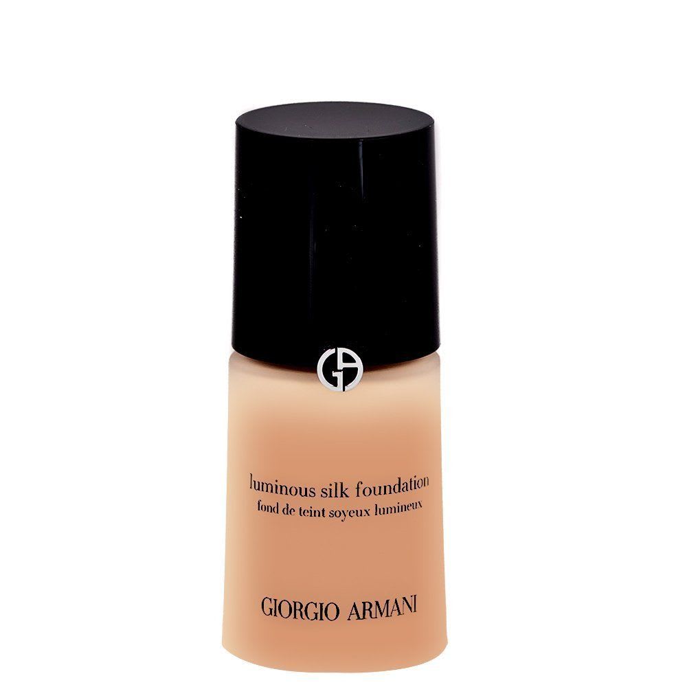 Giorgio Armani Luminous Silk Foundation in a natural beige shade, shown in a frosted glass bottle with a black cap and minimalist label, displayed against a clean white background.