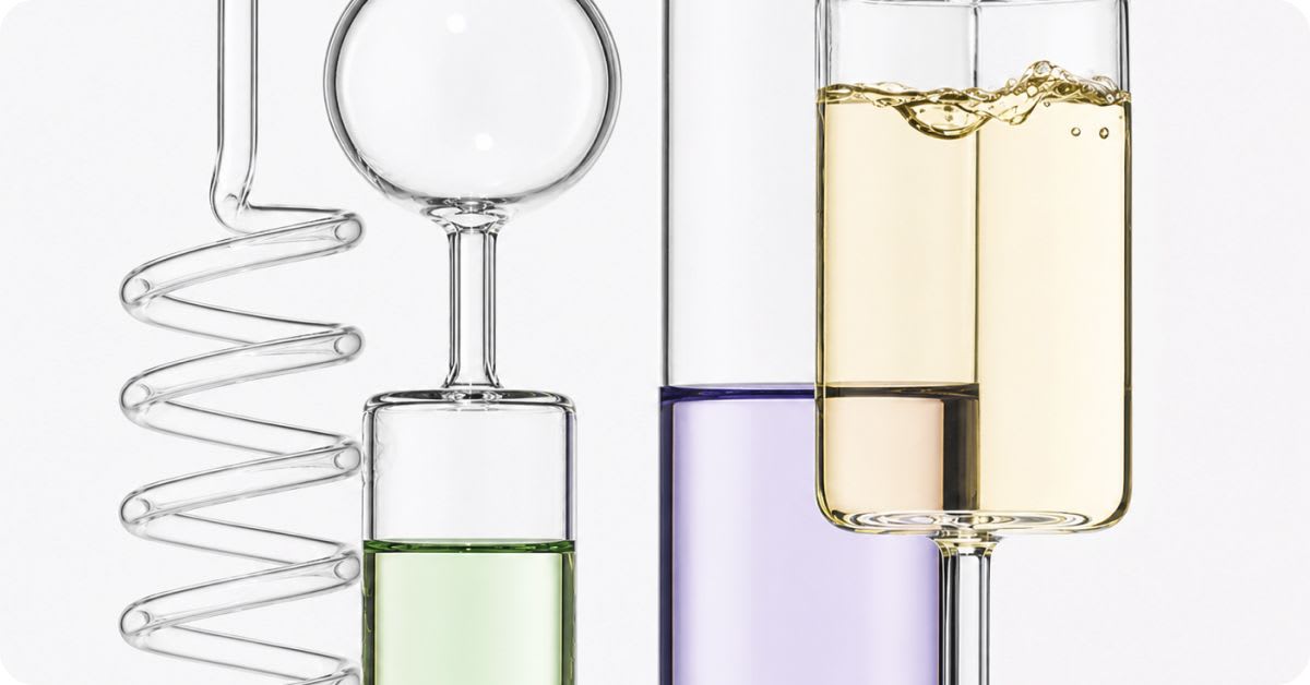  Laboratory glassware filled with green, purple, and yellow liquids arranged on a light background, illustrating cosmetic ingredient testing and regulatory compliance procedures.