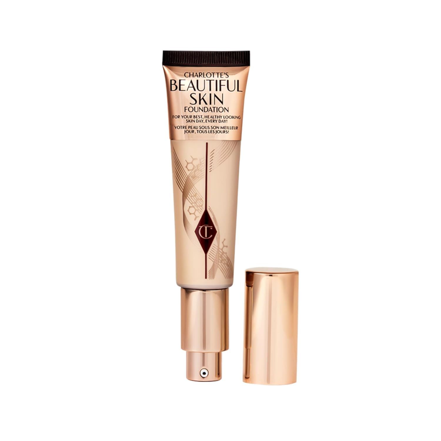 Beige and rose-gold tube of Charlotte Tilbury Beautiful Skin Foundation with a pump dispenser and a gold cap.