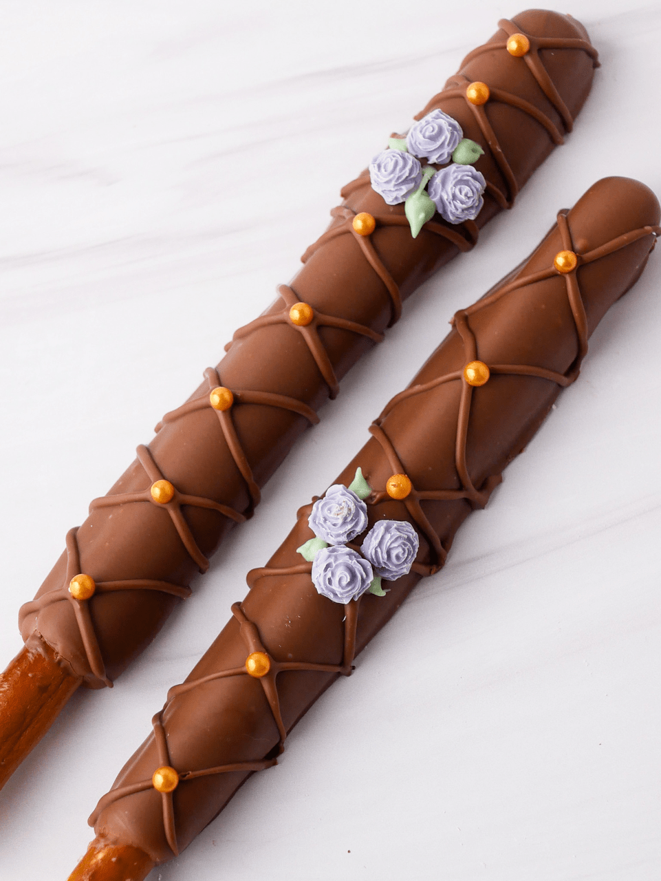 Milk chocolate pretzel pair w purple roses