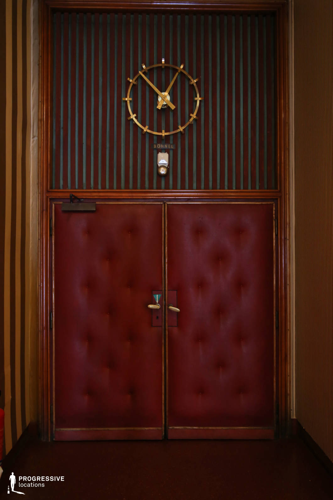 Locations in Austria: Screening Room Door with Clock, Filmcasino