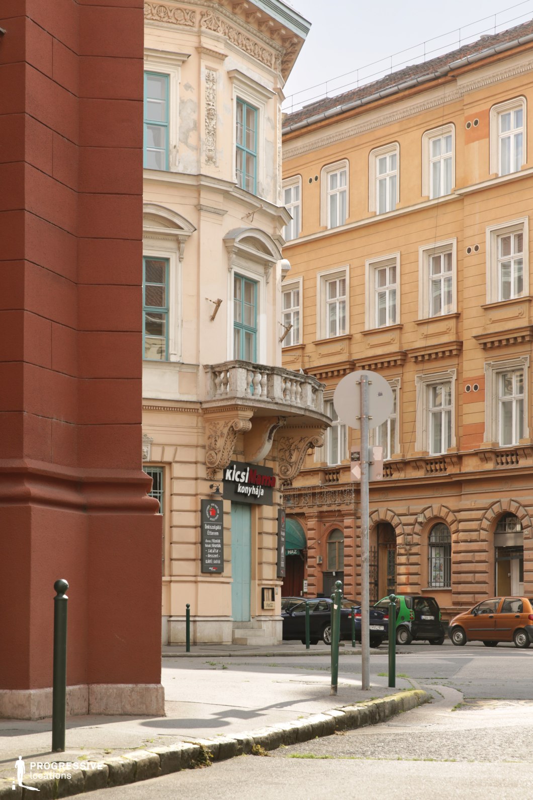 Ornate balcony and classic facade details in an urban setting as a film and photography location