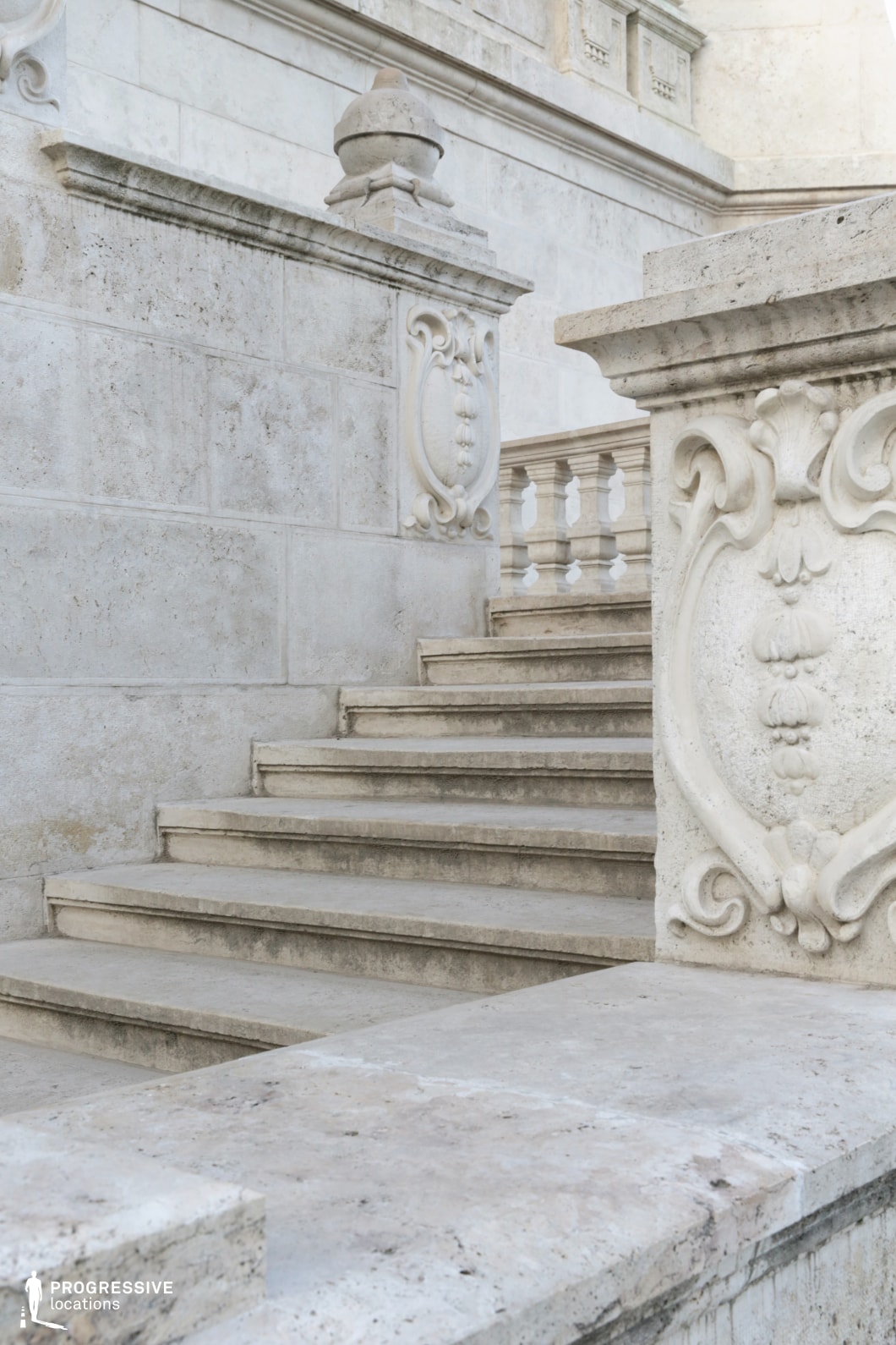 Carved stone staircase with decorative panels, shooting location for film and photography projects highlighting detailed textures