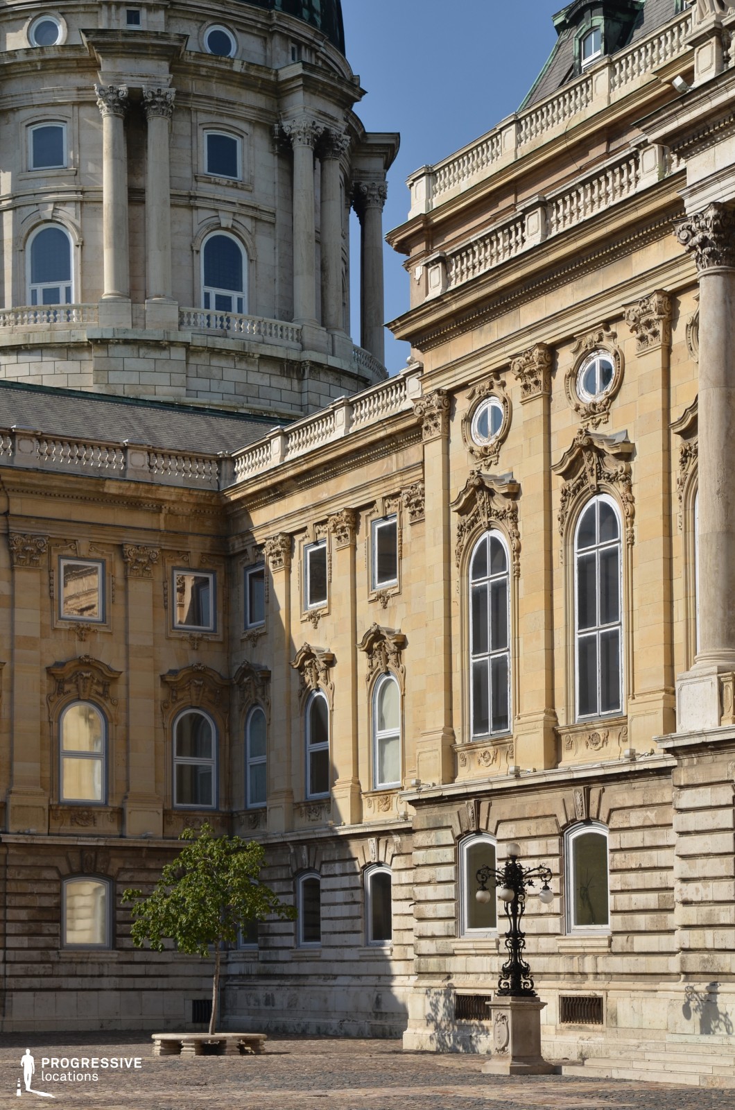 Detailed palace facade with arched windows, film and photography location emphasizing ornate stonework and architectural rhythm