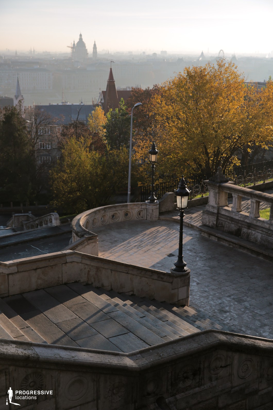 Curved stone stairs and terrace, available for filming or photo shoots with layered levels and decorative railings