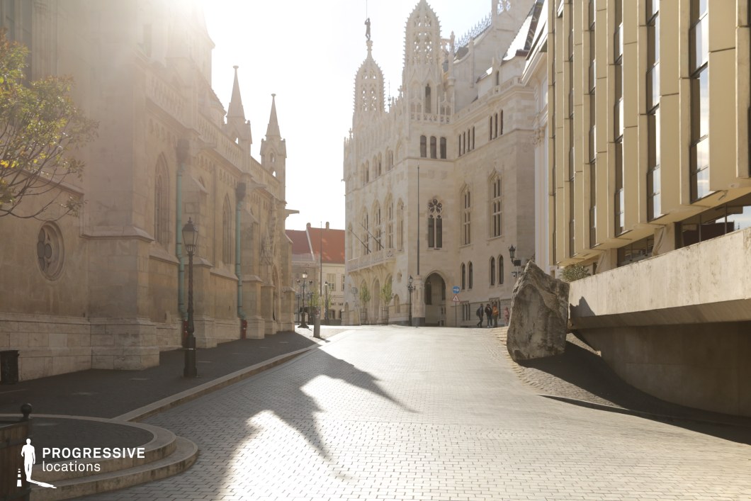 Narrow street with Gothic buildings, a film and photography location defined by vertical facades and structured perspective
