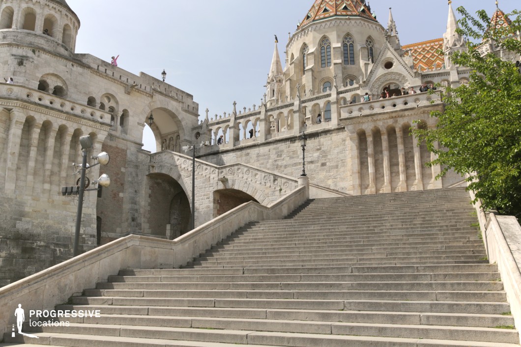 Historic stone staircase with arches and terraces, a strong film and photography location with layered architectural depth