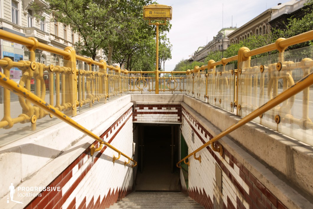 Symmetrical stair entrance with railings and tiled walls creates a shooting location for film and photography projects