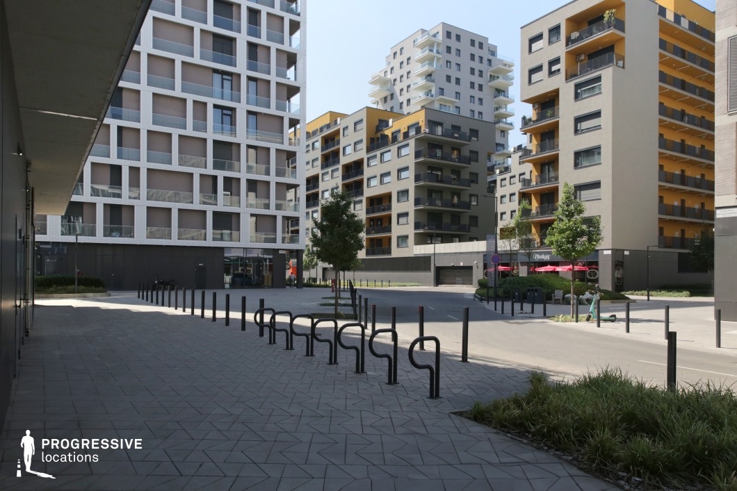 Modern urban square with bollards and buildings, shooting location for film and photography projects