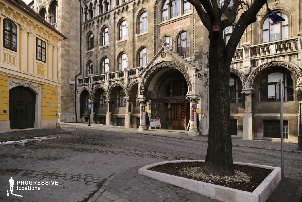Historic building with ornate arched entrance, film and photography location with strong architectural detail