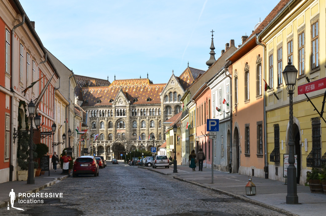 Historic street with church tower view, ideal location for photography and filming