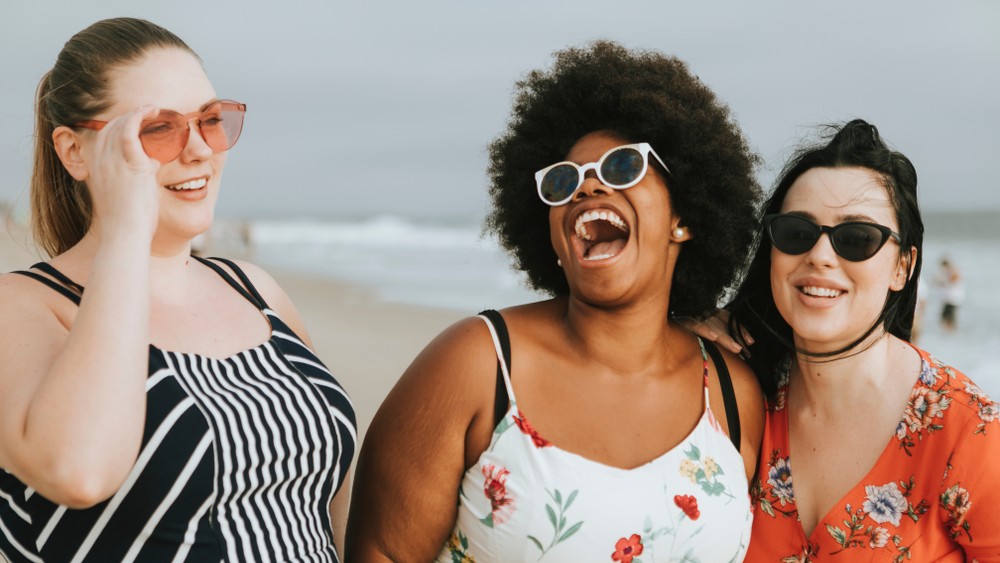 Plus Size Casting Calls - Cheerful diverse plus size women at the beach