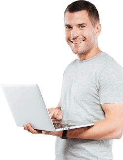 happy man holding laptop