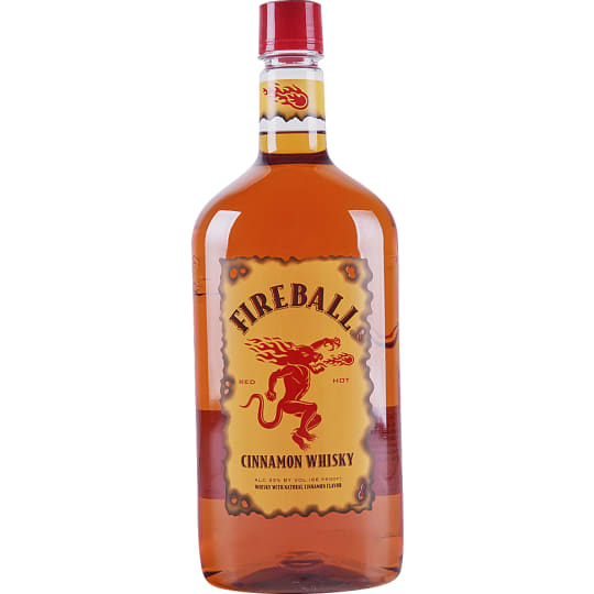 Fireball Cinnamon Flavored Whiskey - 1.75L - Fireball Cinnamon Whisky needs no introduction. If you haven't tried it, just imagine what it's like to get a Chuck Norris roundhouse kick to the face if his legs were on fire and tasted like cinnamon. Live it, love it, shoot it -- your dad's whisky.