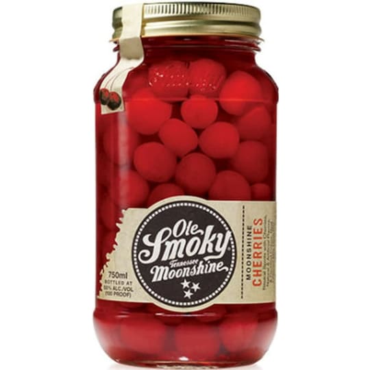 Ole Smoky Cherries Whiskey Moonshine - 750mL - With a nod to Appalachian creativity, Ole Smoky took maraschino cherries and gave them a good, long soak in their 100 proof original moonshine. And, once the cherries are gone, the remaining moonshine offers a lingering sweet nectar that blends into cherry cola or ginger ale like long lost lovers.