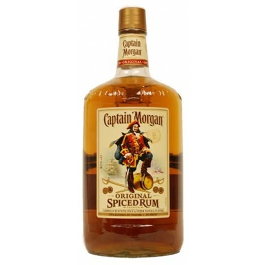 Captain Morgan Original Spiced Rum - 1.75L - Captain Morgan uses molasses, water, mash and yeast to create its distinctive, full bodied base. This mixture is then added to a continuous still. Once this process is complete it is aged in oak barrels for close to one year in order to lend a golden color and more character to the spirit. Using a top secret blend of exotic island spices, fruit flavors and vanilla, Captain Morgan Gold Rum develops a distinctive and satisfying flavor. ABV 35