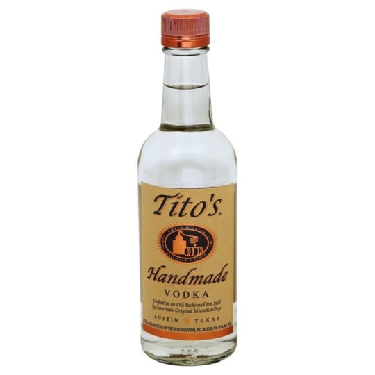 Tito's Handmade Vodka - 375mL - Tito's Handmade Vodka is designed to be savored by spirit connoisseurs. It is micro-distilled in an old-fashioned pot still, just like fine single malt scotches and high-end French cognacs. This time-honored method of distillation requires more skill and effort than modern column stills, but it's well worth it. Our handcrafted technique offers more control over the distillation process, resulting in a spectacularly clean product of incomparable excellence. Only the heart of the run, "the nectar" is taken, leaving behind residual higher and lower alcohols. The vodka is cleansed of phenols, esters, congenersand organic acids by filtering it through the finest activated carbon available. Critics call Tito's "a homegrown symphonic spirt to applaud!" and say "it can go head to head with any of the worlds' greats and not break a sweat."Tito's Handmade Vodka is designed to be savored by spirit connoisseurs. It is micro-distilled in an old-fashioned pot still, just like fine single malt scotches and high-end French cognacs. This time-honored method of distillation requires more skill and effort than modern column stills, but it's well worth it. Our handcrafted technique offers more control over the distillation process, resulting in a spectacularly clean product of incomparable excellence. Only the heart of the run, "the nectar" is taken, leaving behind residual higher and lower alcohols. The vodka is cleansed of phenols, esters, congenersand organic acids by filtering it through the finest activated carbon available. Critics call Tito's "a homegrown symphonic spirt to applaud!" and say "it can go head to head with any of the worlds' greats and not break a sweat."Titos Handmade Vodka is designed to be savored by spirit connoisseurs. It is micro-distilled in an old-fashioned pot still, just like fine single malt scotches and high-end French cognacs. This time-honored method of distillation requires more skill and effort than modern column stills, but it?s well worth it. Our handcrafted technique offers more control over the distillation process, resulting in a spectacularly clean product of incomparable excellence. Only the heart of the run, 'the nectar' is taken, leaving behind residual higher and lower alcohols. The vodka is cleansed of phenols, esters, congenersand organic acids by filtering it through the finest activated carbon available. Critics call Tito?s 'a homegrown symphonic spirt to applaud!' and say 'it can go head to head with any of the worlds? greats and not break a sweat.'