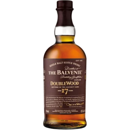 The Balvenie 17 Year Old DoubleWood Single Malt Scotch Whiskey - 750mL - The DoubleWood 17 year old is an elder sibling to DoubleWood 12 year old and shares its honeyed, spicy characteristics, but it is distinctly different, with deeper vanilla notes, hints of green apple, creamy toffee and a striking richness and complexity.