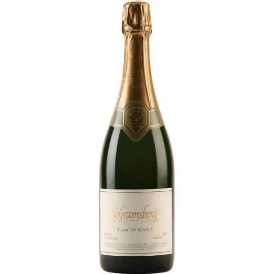 Schramsberg Blanc de Blancs Brut NV - 750mL - Schramsberg Blanc de Blancs is a Napa Valley sparkling wine made entirely from Chardonnay using the traditional method. It shows bright aromas of lemon, green apple, pear, and citrus blossom, with subtle notes of brioche and toasted almond, carried by a crisp palate and fine, persistent bubbles.  It stands out as one of California’s benchmark sparkling wines, known for its precision, freshness, and extended aging on lees that gives it depth while maintaining a clean, energetic profile.